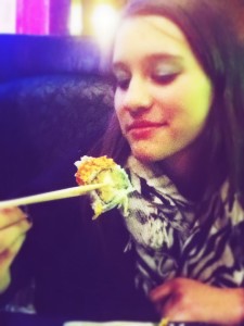 Reporter sampling the Crunchy Roll at Sakura