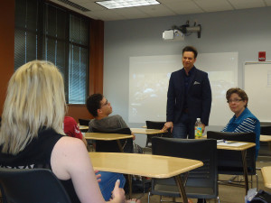 Sioux City Symphony Orchestra Conductor Ryan Haskins answers questions from students